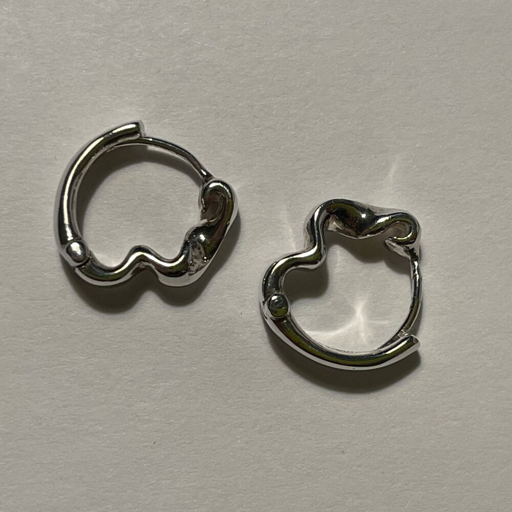 Estée Lalonde Flow Huggie Hoop Earrings in silver